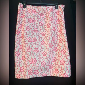 Lily Pulitzer pink and white floral skirt, zips up back.